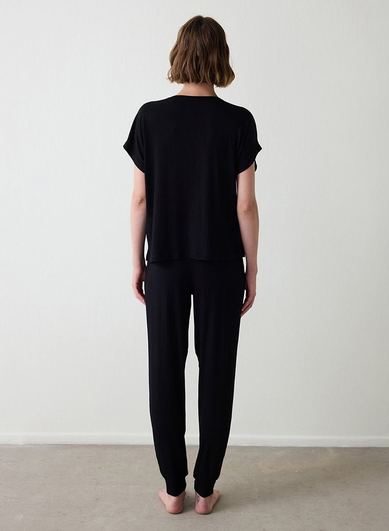 بنتي طقم بيجامة قطن بأكمام قصيرة وياقة دائرية لوقت العطلة - Image 4